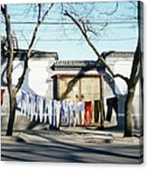Laundry Drying On Clotheslines In Street Canvas Print