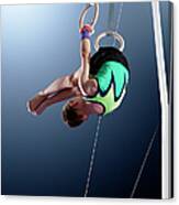 Male Gymnast Performing Somersault On Canvas Print