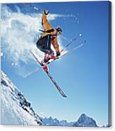Male Skier In Mid-air, Low Angle View Canvas Print