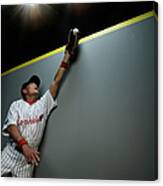 Mixed Race Baseball Player Catching Ball Canvas Print
