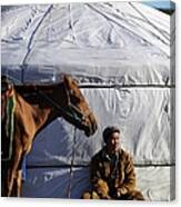 Mongolian Herder Sits Outside Ger With Canvas Print