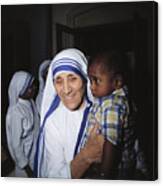 Mother Teresa Holding Young Boy Canvas Print