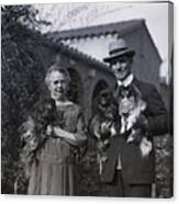 Mr. And Mrs. Tommy Ryan Hold Dogs Canvas Print