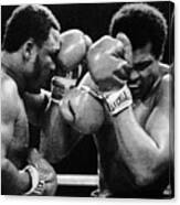 Muhammad Ali Covers As Joe Frazier Punch Canvas Print