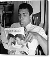 Muhammad Ali Reading A Magazine Canvas Print