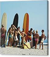 People On Beach With Surf Board Canvas Print