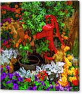 Red Pump In Flower Garden Canvas Print