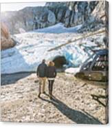 Retired Couple Take Helicopter To See Glacial Ice Cave. Canvas Print