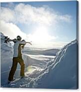 Skier Carrying Skies On The Shoulder Canvas Print