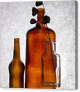 Still Life With Colored Bottles And A Dried Twig Canvas Print