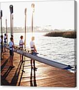 Team Of Rowers Standing With Canoe On Canvas Print