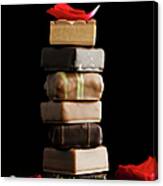 Tower Of Chocolates With Rose Petals On Canvas Print