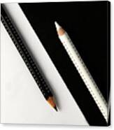 Two Drawing Pencils On A Black And White Surface. Canvas Print