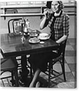 Woman In Fancy Hat Eating Breakfast In Canvas Print
