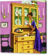 Woman Looking In A Drawer Of A Dining Room Hutch Canvas Print