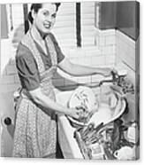 Woman Washing Dishes In Kitchen Sink Canvas Print