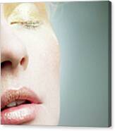 Young Woman With Gold Make Up On Face Canvas Print