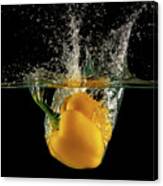 Yellow Bell Pepper Dropped And Slashing On Water Canvas Print