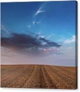 Agricultural Meadow Field And Cloudy Sky During Sunset. Canvas Print