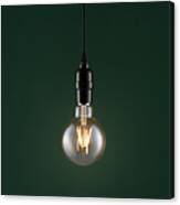 Retro Style Light Bulb On Dark Green #2 Canvas Print
