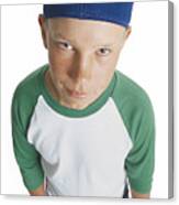 A Caucasian Male Preteen In A Green And White Shirt And Blue Cap Holds His Mitt And Smirks Looking Up Towards The Camera Canvas Print