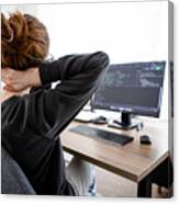 A Woman Holding Her Neck While Working On Computer Sitting At Desk At Home Canvas Print