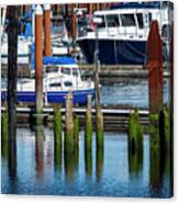 Boats And Old Pilings Canvas Print