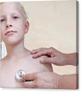 Boy Being Examining By Doctor With Stethoscope Canvas Print