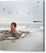 Boy In Frozen Sea. Canvas Print