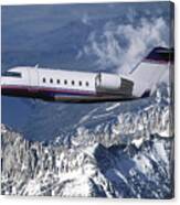 Challenger Corporate Jet Over Snowcapped Mountains Canvas Print