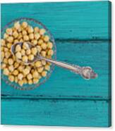 Chick Peas On A Wood Background Canvas Print