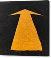 Close-Up Of Arrow Sign On Road Canvas Print