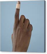 Close Up Of Finger With Band-aid Canvas Print