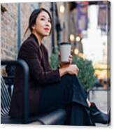 Confident Young Woman Drinking Coffee, Sitting At A Sidewalk Cafe Canvas Print