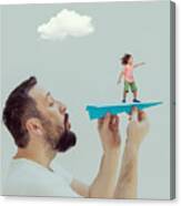 Father Holding Superhero Son Flying On Paper Airplane At Home Canvas Print