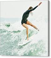 Female Athlete Wakesurfing During Early Morning Session On Lake Canvas Print