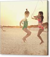 Girls Jumping Rope On Beach Canvas Print