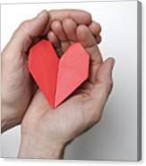 Hands Holding Folded Origami Heart White Background Canvas Print