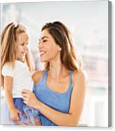 Happy Mother And Daughter At Home. Canvas Print