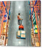 High Angle View Of Male Warehouse Worker. Canvas Print