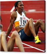 Kelly Holmes Of Great Britain Sits On The Track Canvas Print