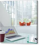Laptop On Work Desk In Office Building Canvas Print
