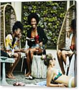Laughing Friends Sharing Food And Drink During Party At Hotel Pool Canvas Print