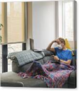 Man In Self Isolation On The Sofa With The Flu Canvas Print