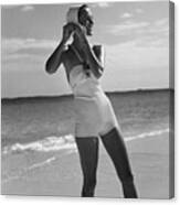 Model On A Beach Fastening Her Bathing Cap Canvas Print