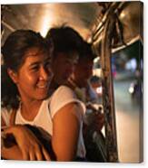 Multi-ethnic Asian Friends Riding Jeepney In Manila At Night Canvas Print