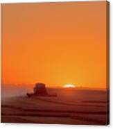 On Fields Of Gold - Combine At Sunset In A Nd Wheat Field Canvas Print