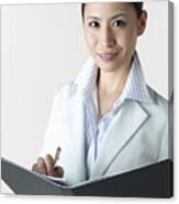Portrait Of A Businesswoman With A Folder In Her Hands Canvas Print