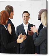 Portrait Of Business Executives Applauding Canvas Print