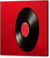 Record Against Red Background Canvas Print